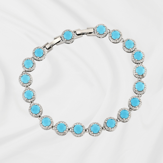 Pulseira azul zircônia ródio branco com pedra central e micro zircônias cristal