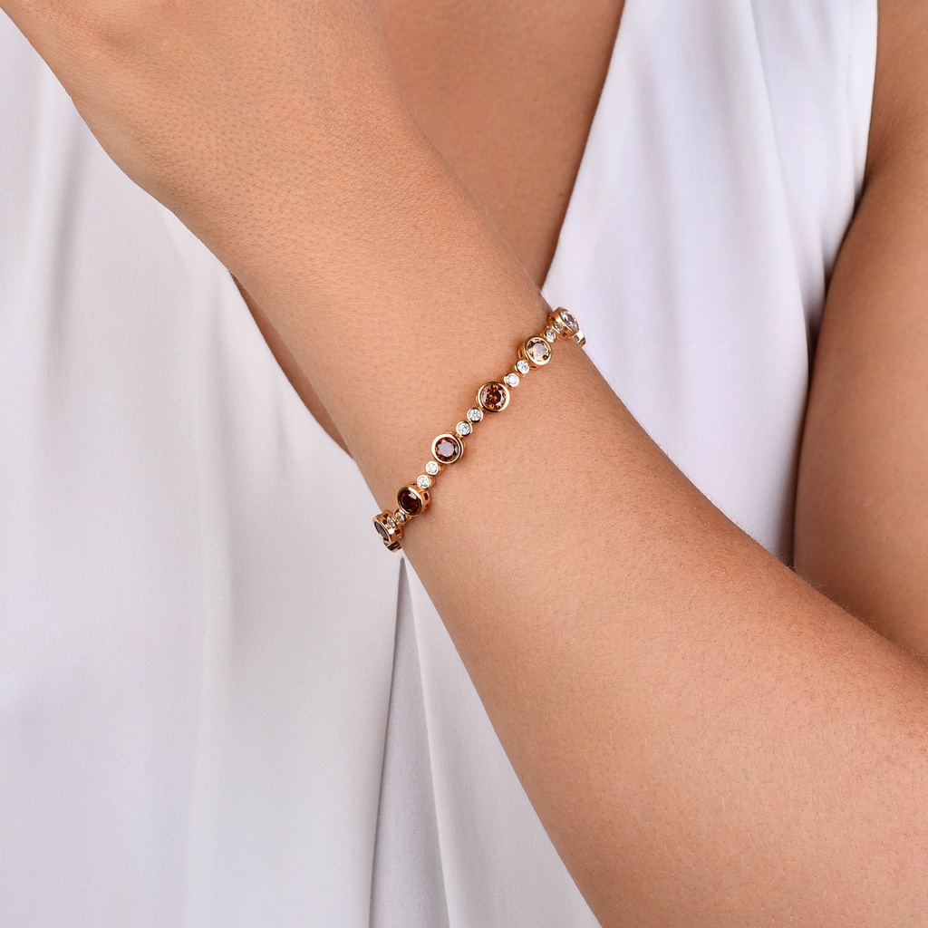 PULSEIRA ZIRCÔNIAS ÂMBAR BANHO OURO