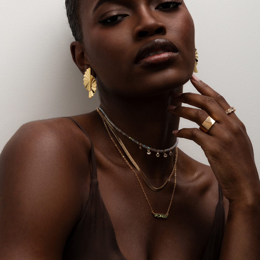 BRINCO LEQUE BANHO OURO 18K