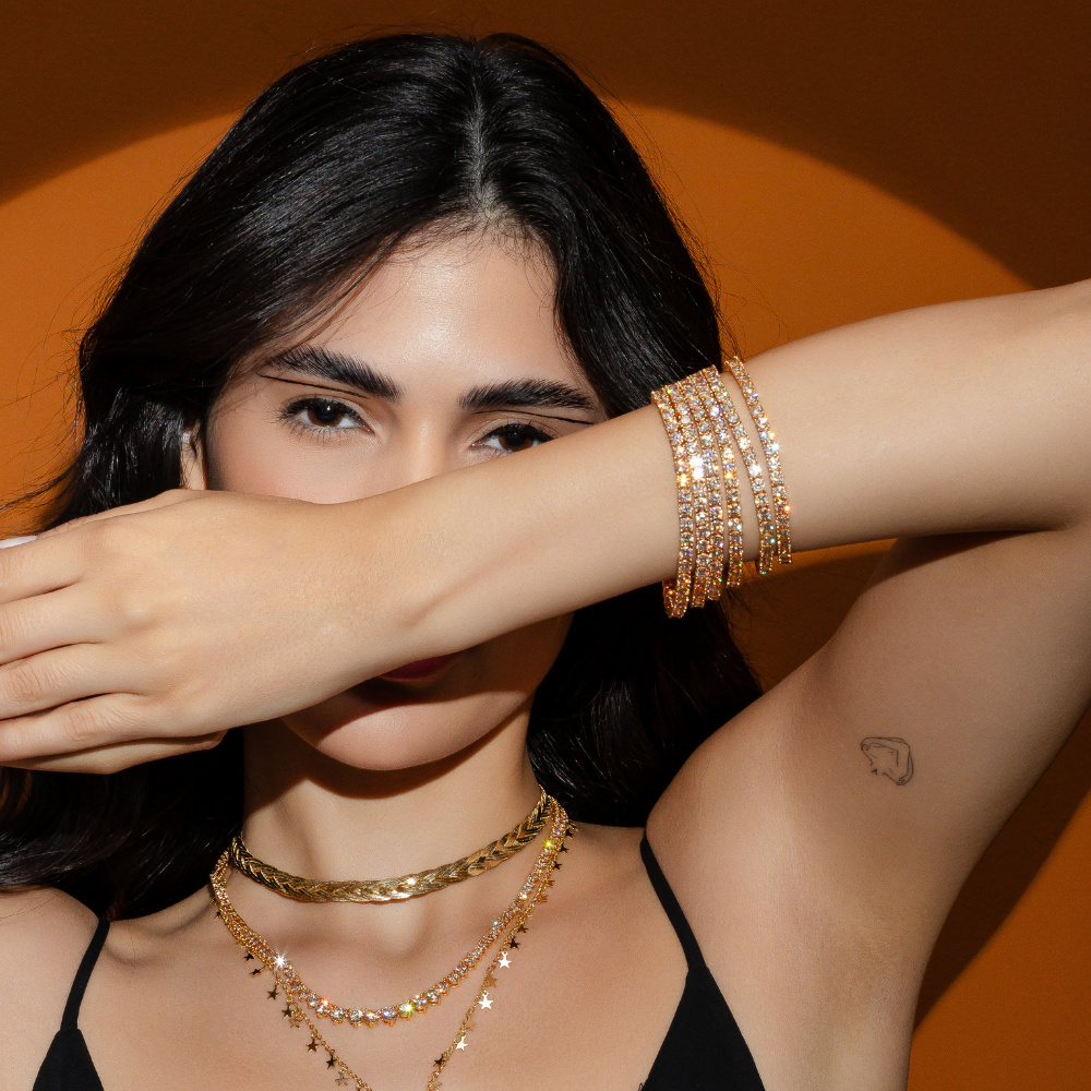 PULSEIRA RIVIERA CHAMPAGNE OURO 18K